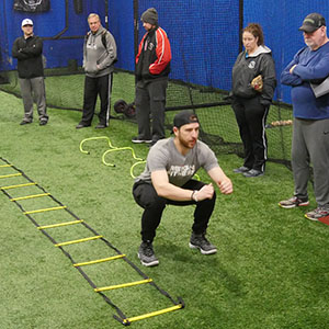 Coach James shares some agility workouts with D1 Little League coaches