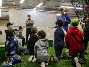 Coach Kai talks with players at his first BASE by Pros camp on Dec. 9, 2017.