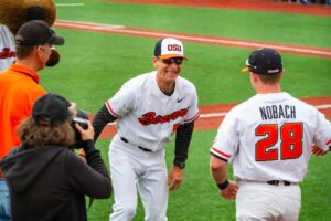 Pat Casey Welcomes Kyle Nobach During Pre-Game Introduction on Senior Day at Oregon State University in 2018