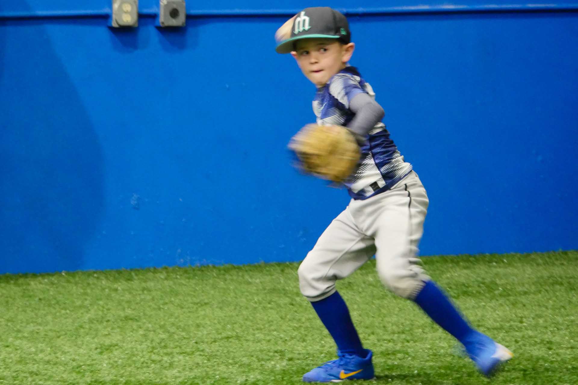 Little Boy Throwing a Baseball