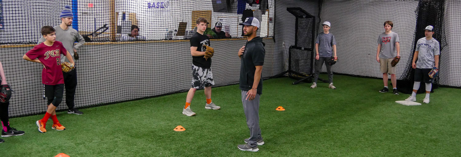 Kainoa Correa Offering Instruction at a Fielding Camp