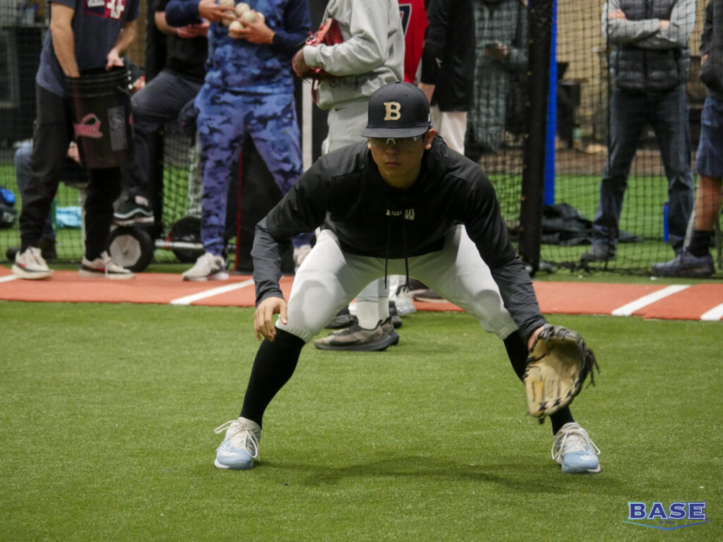 Player Fielding a Ball at an Infield Clinic