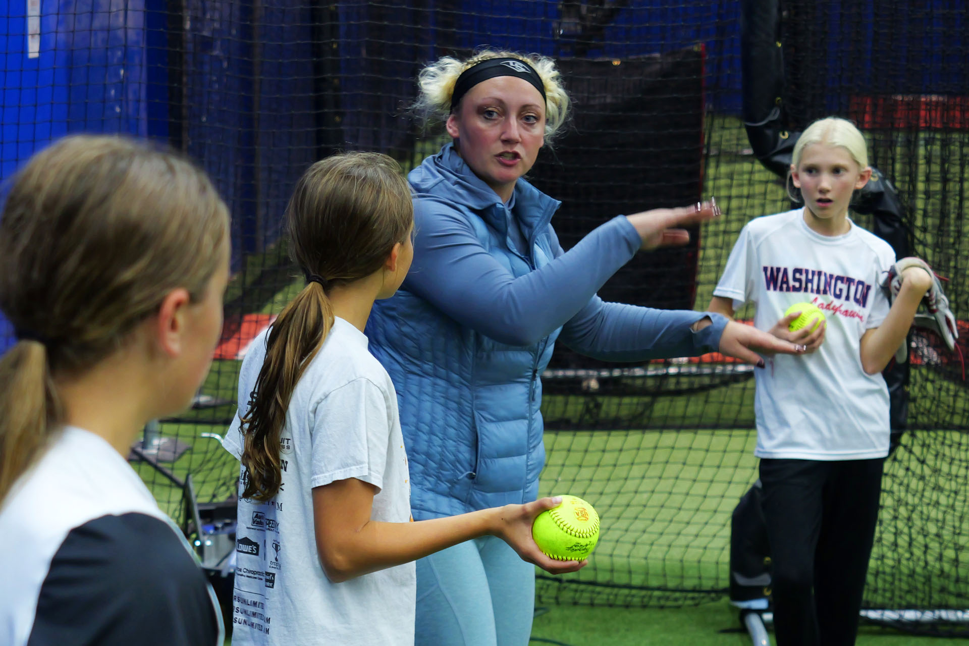 Coach Kylee Instructing Softball Pitchers