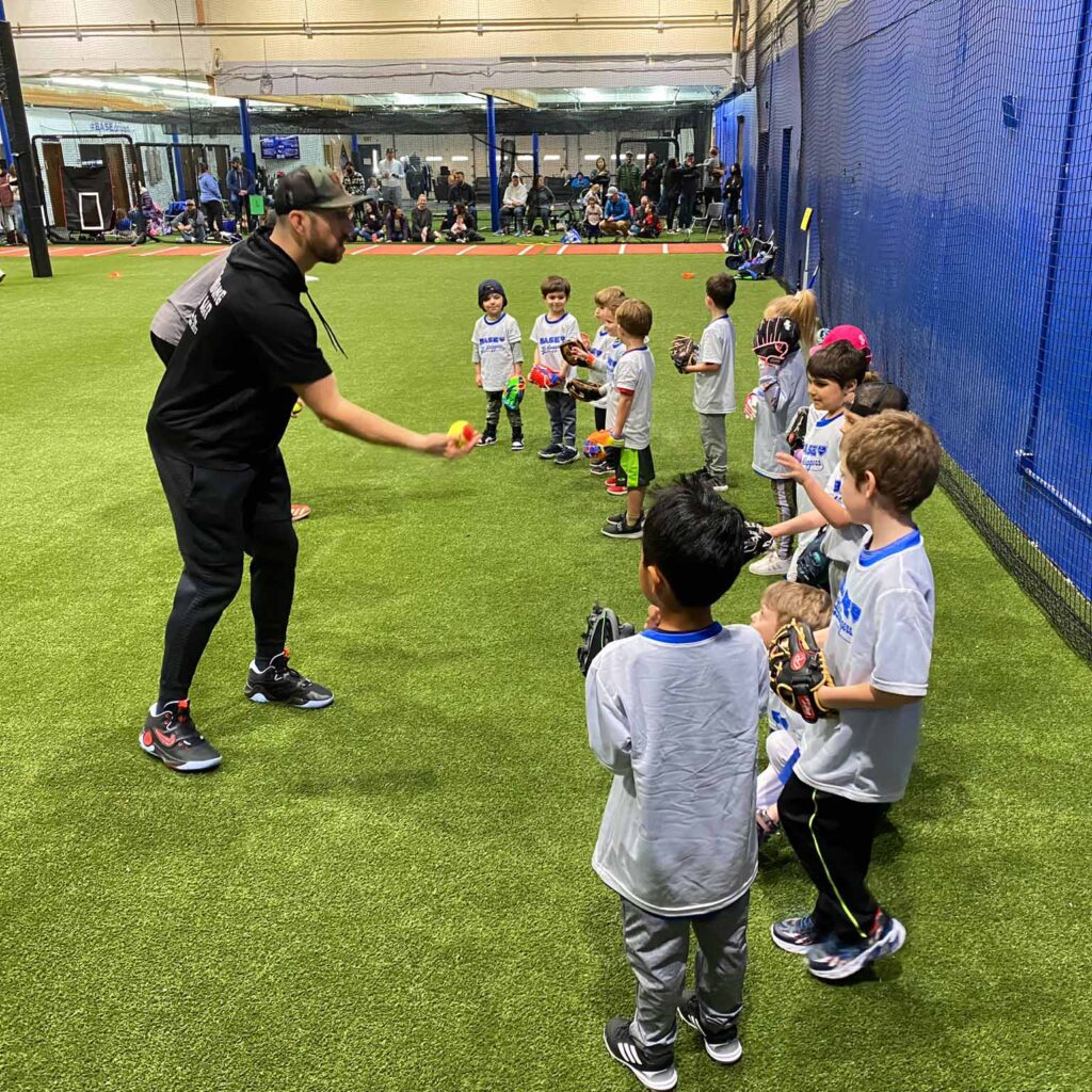 Steven Souza Jr. works with youngsters on how to catch