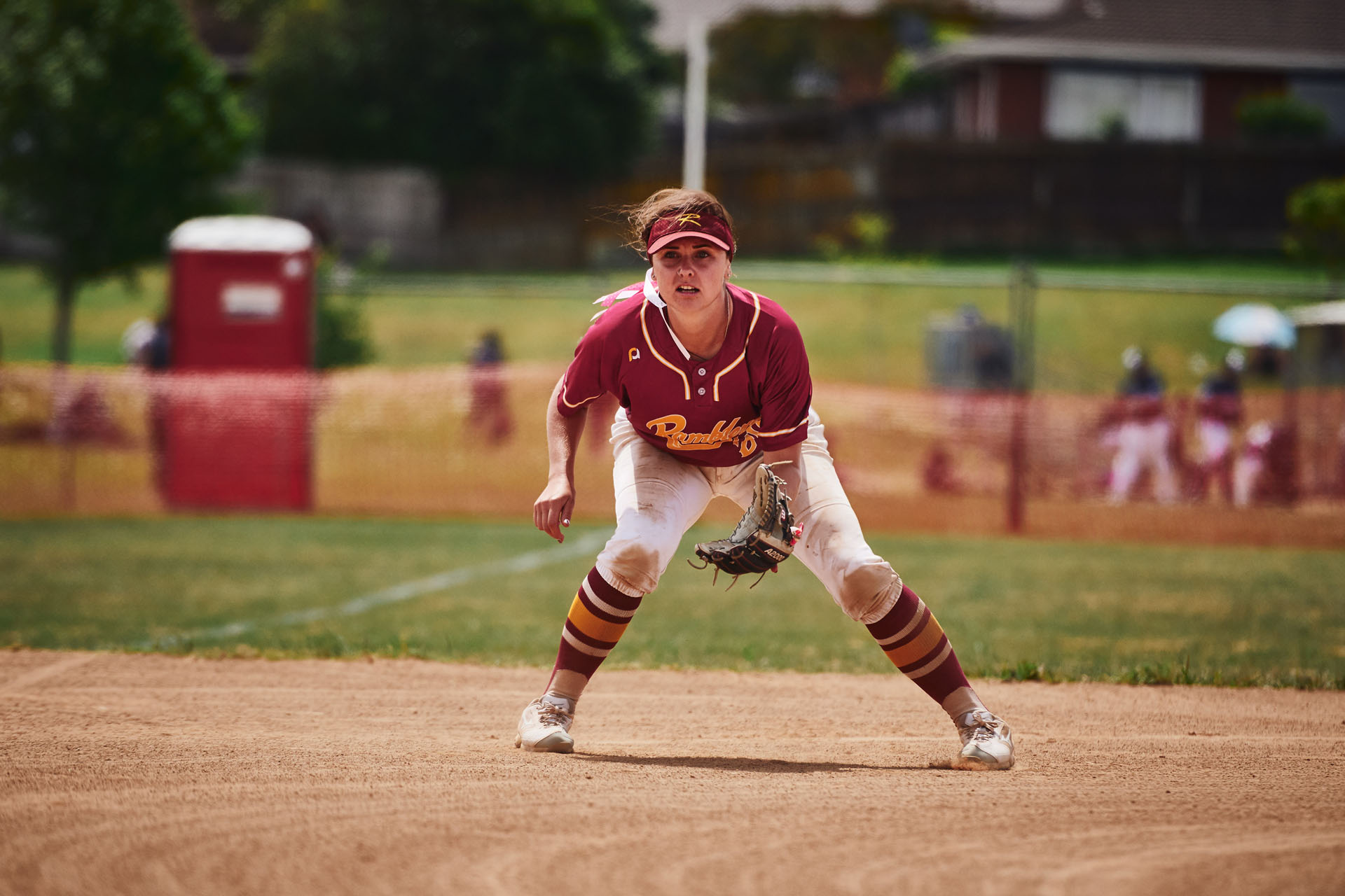 Softball Player Lisa Maulden Prepares to Field a Ball at Third Base