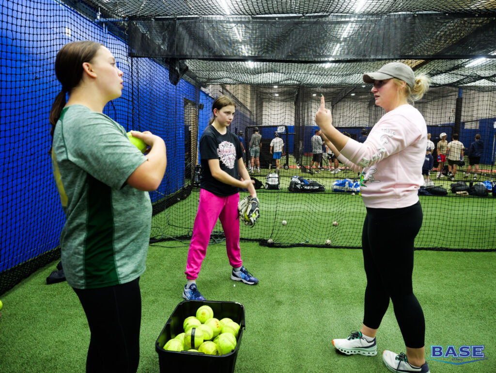 Softball Pitching Coach Kylee Works with Pitchers