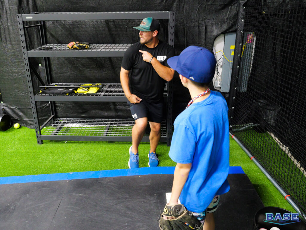 Coach Josh Works with a Pitcher